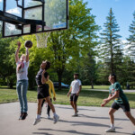 5:59 p.m. A pickup game of basketball forms (W. Scott Olsen)
